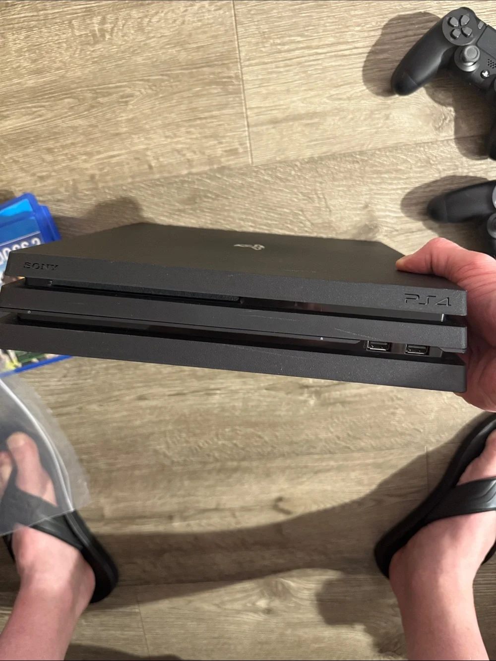 Sony PlayStation 4 Slim Matte Black Console with Two Black DualShock Controllers